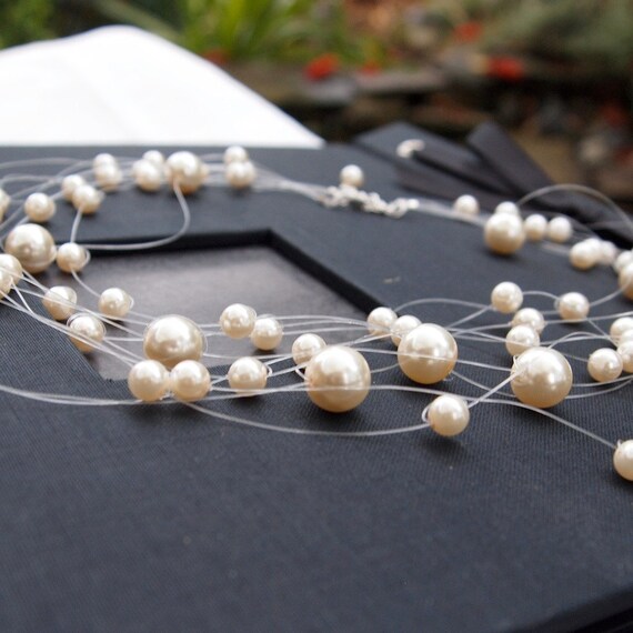 Items similar to Floating pearls necklace on Etsy