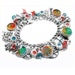 see more listings in the Charm Bracelets-Designer section