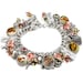 see more listings in the Charm Bracelets-Designer section