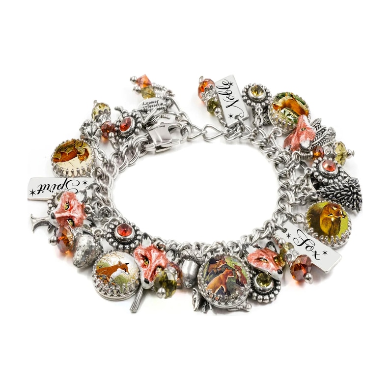 A bracelet adorned with various charms, including a fox charm, and colorful beads.