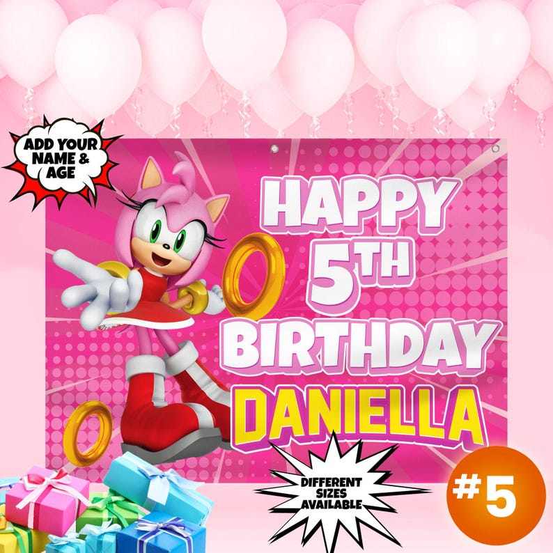 May include: Pink and yellow birthday banner featuring a cartoon character with a pink dress and a gold ring. The banner says "Happy 5th Birthday Daniella" and has a pink and white polka dot background.