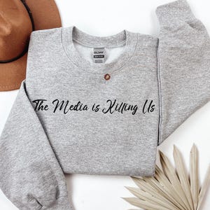 The Media is Killing Us Minimalist Sweatshirt | Cozy Unisex Subtly Political Crewneck, Truth Seeker Top, Gifts for Friends, Media Awareness
