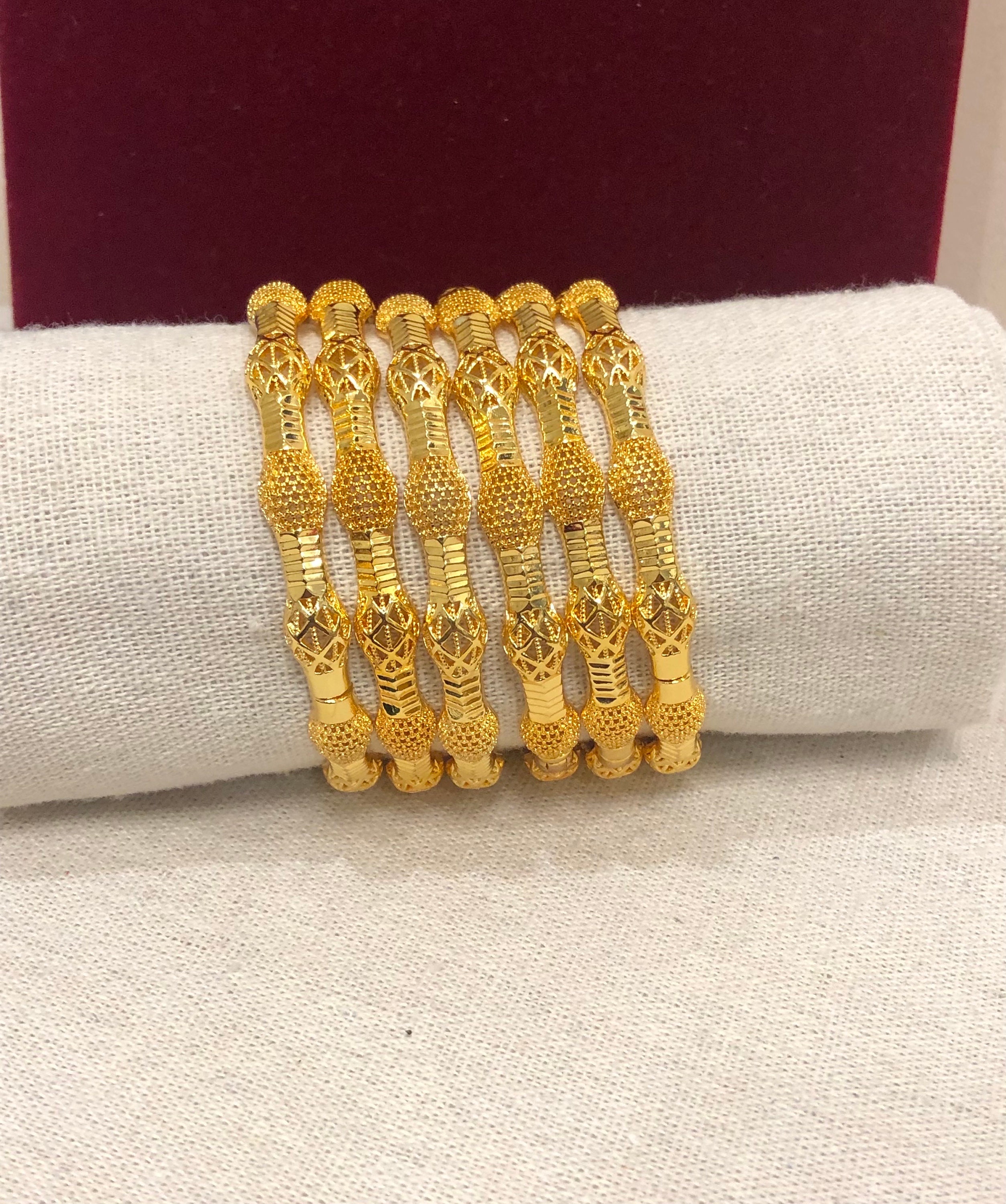 Artificial gold bangles design best sale