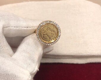 Gouden ring, lire-sieradenring, muntring, mode uit het Midden-Oosten