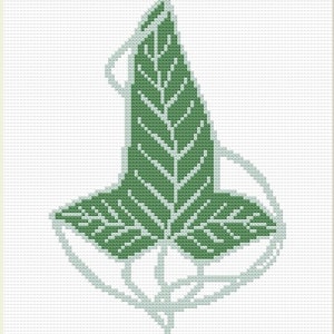 Puede incluir: Un diseño de hoja verde con una forma estilizada y abstracta. La hoja está compuesta por varias hojas más pequeñas, creando un efecto de capas.
