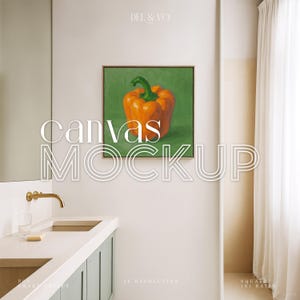 May include: A framed canvas mockup featuring a vibrant orange bell pepper painting against a green background. The artwork is displayed in a modern bathroom setting. The words "canvas MOCKUP" are overlaid on the image.