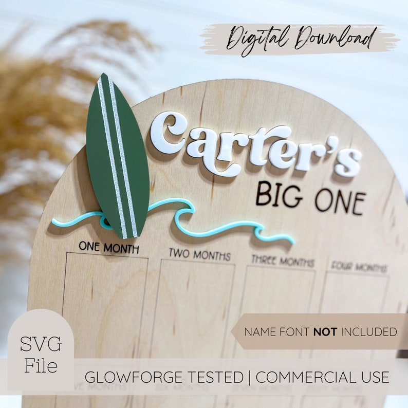 May include: Wooden milestone board with the text "Carter's BIG ONE". Features a green surfboard, blue wave accents, and spaces for monthly milestones. Includes the text "Digital Download" and "SVG File".