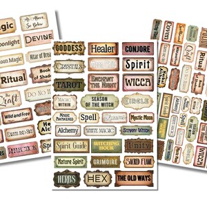May include: A set of three sheets of vintage-style labels with a witchy theme. The labels feature words and phrases related to witchcraft, such as "Moon", "Magic", "Witch", "Spell", "Ritual", "Covenant", "Goddess", "Healer", "Conjure", "Spirit", "Wicca", "Tarot", "Grimoire", "Hex", "The Old Ways", and more. The labels are printed on a white background with a distressed, vintage look.