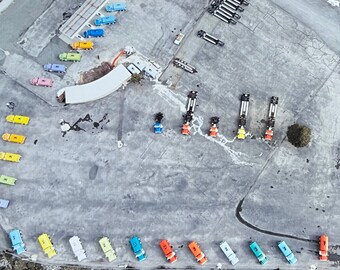 Truck Village / The Skittle Trucks, Weed, Siskiyou County, California. Unique Fine Art Photographic Matted Print by Philip Rowntree.