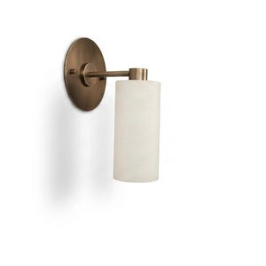 May include: A wall-mounted light fixture featuring a circular bronze-toned backplate and a horizontal arm extending to a cylindrical, frosted white glass shade. The metal components have a brushed finish, and the design directs light downward.
