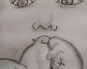 graphite handmade drawing of a baby exploring it's foot