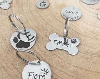Personalized dog tags made of stainless steel and aluminum