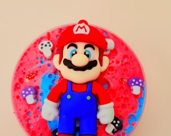 Slime de mantequilla de Super Mario de 142 g, con aroma a fresa y vainilla, incluye dije.