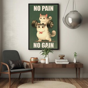 May include: A motivational poster with a green background featuring two cartoon cats lifting a barbell. The text on the poster reads "No Pain No Gain".