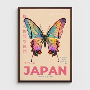 May include: A vintage poster with a colorful butterfly illustration. The poster is titled "Butterfly" and features Japanese text that reads "The elegant flight of a butterfly". The poster also includes the text "Tokyo 1965" and "Japan 1965 June 14th".