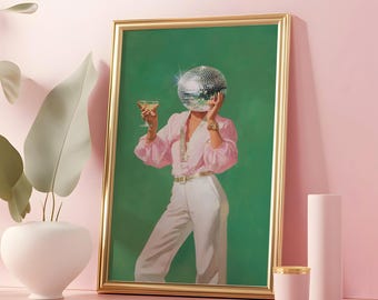 May include: A framed wall art print featuring a figure with a reflective disco ball head, wearing a light pink long-sleeved button-down shirt and white trousers, holding a martini glass against a solid green background.