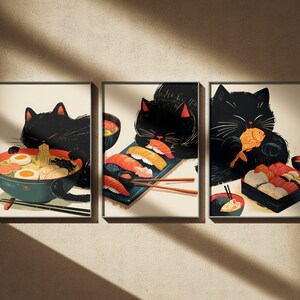 May include: Three framed illustrations of black cats enjoying Japanese food. The first cat is eating ramen noodles, the second is eating sushi, and the third is holding a fish and eating sushi.