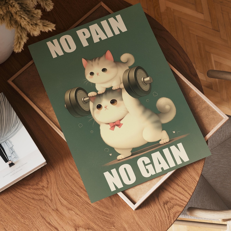 May include: A motivational poster with a green background featuring two cartoon cats lifting a barbell. The text on the poster reads "No Pain No Gain".