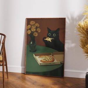 May include: A framed art print depicts a black cat eating pizza. The cat has large, round eyes and is seated at a green table. A vase of yellow flowers and a pizza box are also on the table. The artwork has a vintage aesthetic.