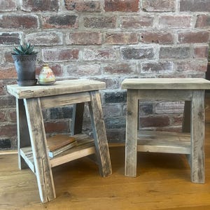 A pair of Side tables crafted from recycled scaffold boards.