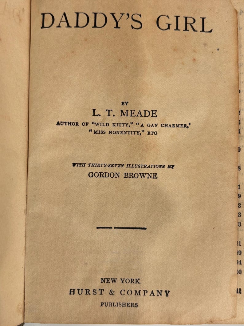 K&ouml;nnte beinhalten: Ein Buchcover mit dem Titel "Daddy's Girl" von L.T. Meade. Das Buch ist illustriert von Gordon Browne und herausgegeben von Hurst & Company.