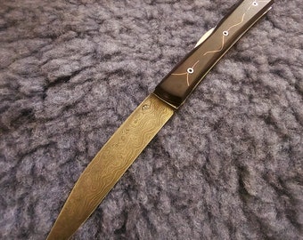 forged folding knife, damascus, multi-spring switch