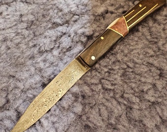 Forged folding knife, damascus, switchblade, ebony and brass marquetry