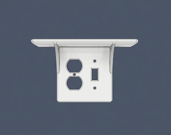 Puede incluir: Un estante de pared blanco con una placa eléctrica integrada que presenta dos aberturas circulares para enchufes y una abertura rectangular para un interruptor de luz, sostenido por dos soportes curvos en los laterales.