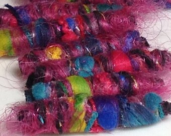 Set of 6 fabric beads. No tropical bird, just a stunningly fabulous Fiber Bead set with colorful plumage. Textile dread sleeve, tube, barrel