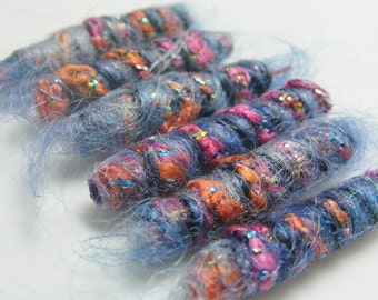 Set of 6 fabric beads.  We'd like to have a conversation with the fiberista but she said no and slammed the drawer. Rude. dread tube slide