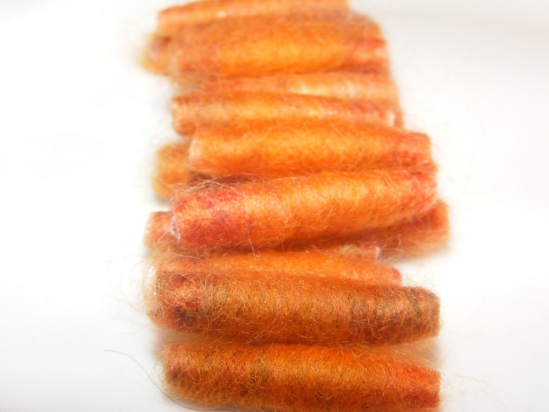 We said She went to cook some carrots and then she made us with orange roving Fiber Bead tube artisan bead make us soft and tender