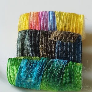 Set of 6 fabric beads. Peacock colors, Marine blue brown and green and then! Bright yellow.. Be not afraid. Fiber Bead, artisan slide tube