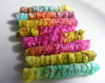 We're fiber bead and can run a long time on one compliment. Give us a heart and we're good for a week. Textile art artisan jewelry tube bead