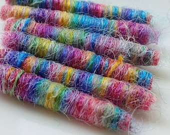 Set of 6 fabric beads. Well look at us! Does this qualify as a Fashion Plate? We think it does.Fiber Bead, multicolor artisan fabric tube