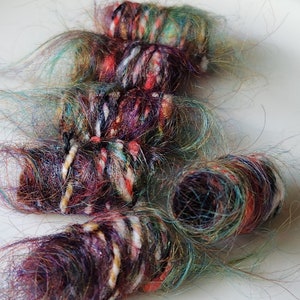 Set of 6 fabric beads. Ok, we&#39;ll be bold. Just call us Minerva, the one who gives all the mind can create. Fiber beads, dread, soft jewelry
