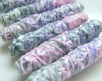 Set of 6 fabric beads. Honoring the reflective moments is our highest priority. After that, it's chocolate. Fiber Dreadlock tube slide