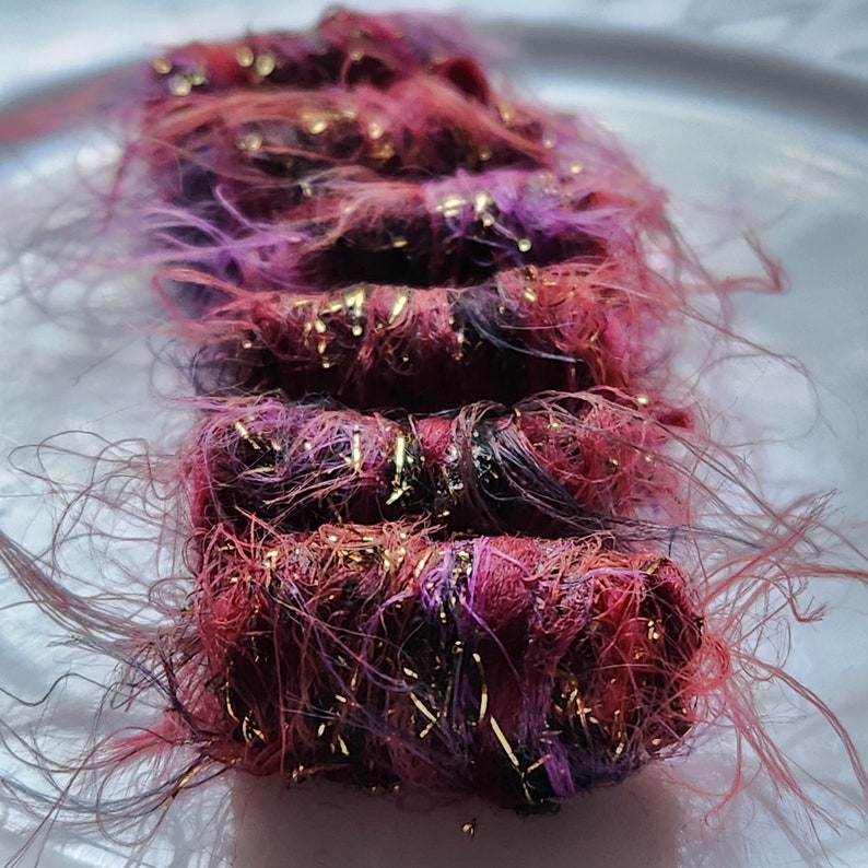 Set of 6 fabric beads. It's rather wonderful, being fiber beads. Our grape color wisps and gold sparkle Added bonus. hair bead tube slide Grape Cran-Orange