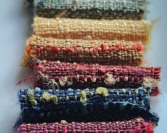 Set of 6 textured, raw edged fabric beads. Available in several colors.