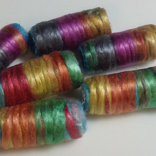 Set of 6 silk beads. It is so darn easy to be happy when you are shiny, rainbow-colored silk yarn. See? Happy! Fiber Beads textile tube