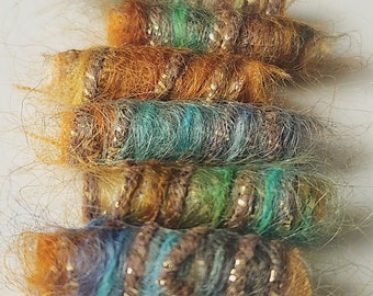 Set of 6 fabric beads. Our luminous earth colors lend us a Southwestern flair. Yee haw!  Fiber bead, tube, barrel, chunky