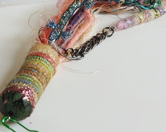 Journal or purse charm, Tassel, Dangle, Embellishment, lightweight pin-on tan, seafoam, orange pink with a touch of blue.