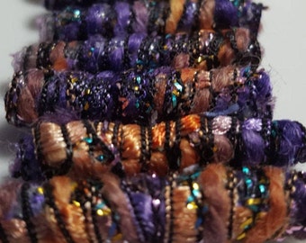 Set of 6 beads. Team colors purple and gold. The question is, which team? Fiber beads, dread loc tube, textile embellishment macrame beads,