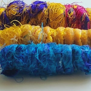 Set of 6 fabric beads. Finally, sari silk is getting a debut in the bead condo. We&#39;ve waited forever for this moment.Fiber sari silk bead