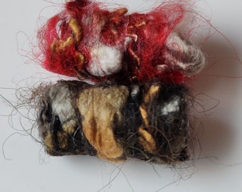 Set of 6 fabric beads. It looks like she gave us fur. Is that fur? Oh shut up. It is too. Fiber Beads, dread decorations, macrame textile