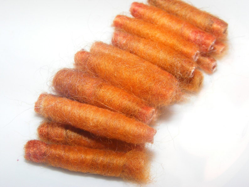 We said She went to cook some carrots and then she made us with orange roving Fiber Bead tube artisan bead make us soft and tender