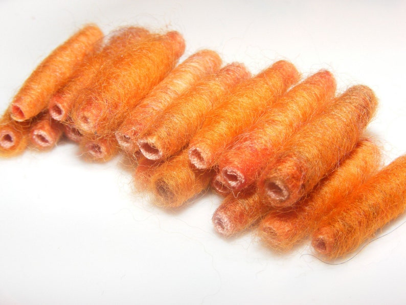 We said She went to cook some carrots and then she made us with orange roving Fiber Bead tube artisan bead make us soft and tender