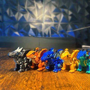 Ispirate ai draghi dell'Arco 1 di Wings of Fire - Statuette di Tsunami, Clay, Sunny, Starflight e Glory immagine 9