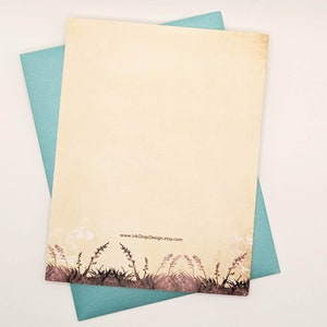 May include: A cream-coloured stationery sheet with a floral border and a teal envelope. The stationery has a vintage aesthetic with a decorative border of brown grass and flowers. The website address www.InkDropDesign.etsy.com is printed on the stationery.