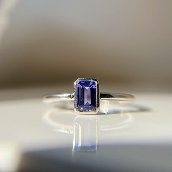 Emerald Cut Tanzanite Ring: 14k White Gold Bezel Set, December