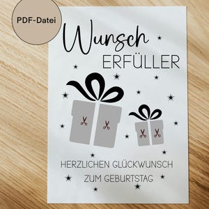 Könnte beinhalten: Eine weiße Karte mit den Worten "Wunsch ERFÜLLER" in schwarzer Schrift, zusammen mit zwei grauen Geschenkboxen mit schwarzen Schleifen und Scheren. Der Text "HERZLICHEN GLÜCKWUNSCH ZUM GEBURTSTAG" ist ebenfalls vorhanden. Ein kreisförmiges Etikett lautet "PDF-Datei im A4-Format".